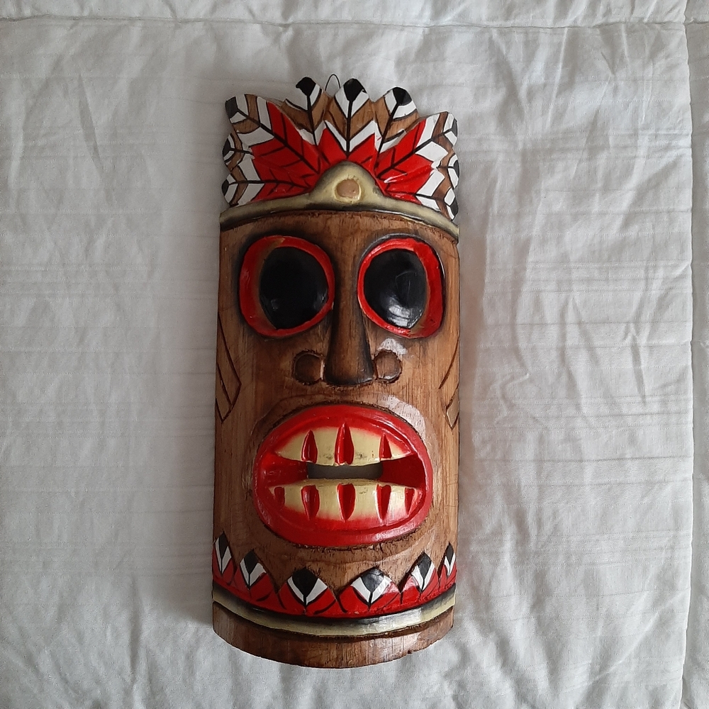 Handcrafted Tribal Mask with Red and Black Accents